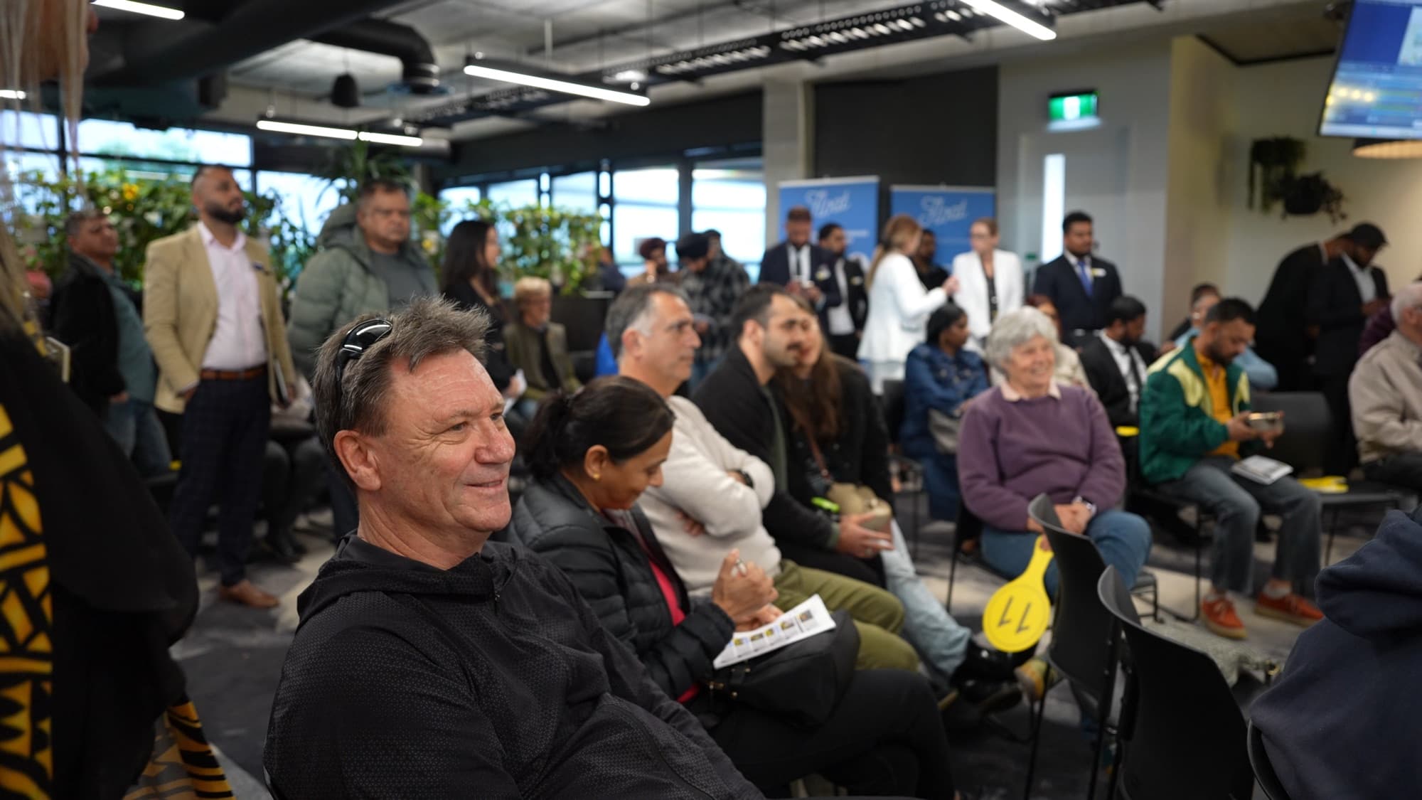Buyers and sellers in the Ray White A T Realty auction room