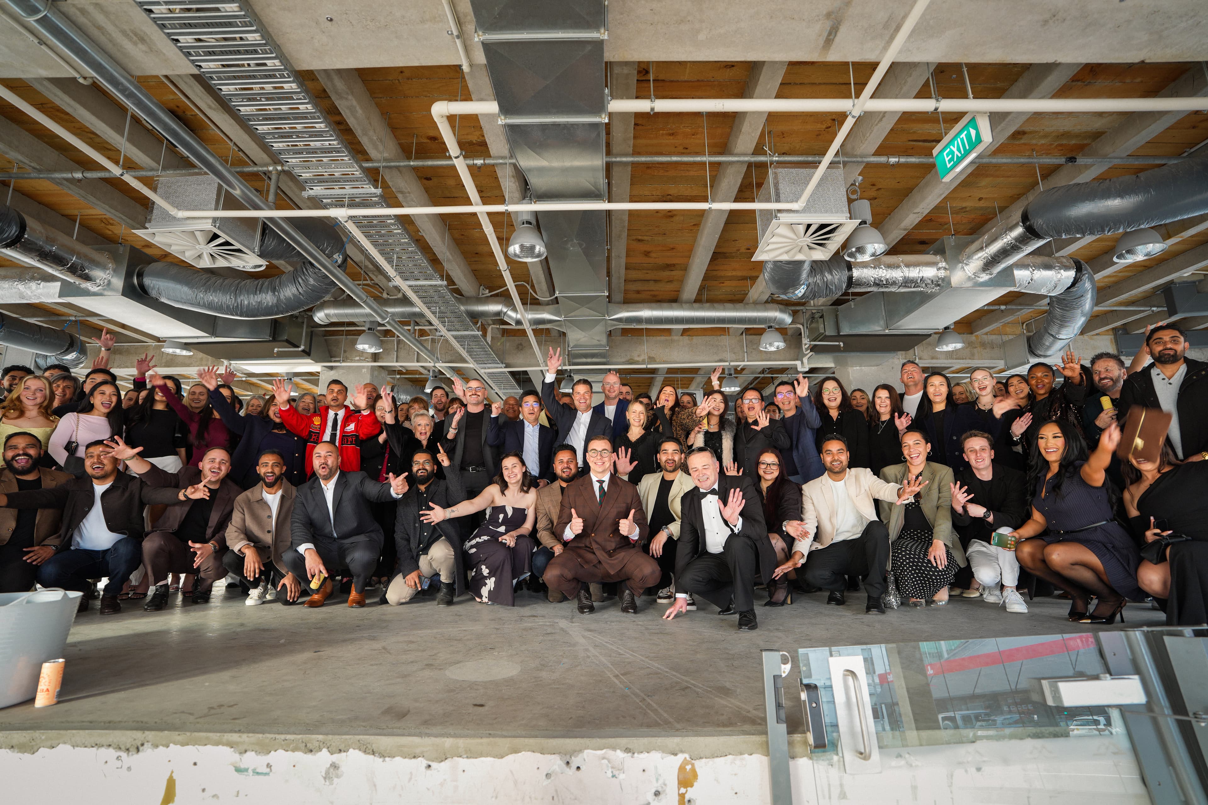 The A T Realty group gathered at a company conference